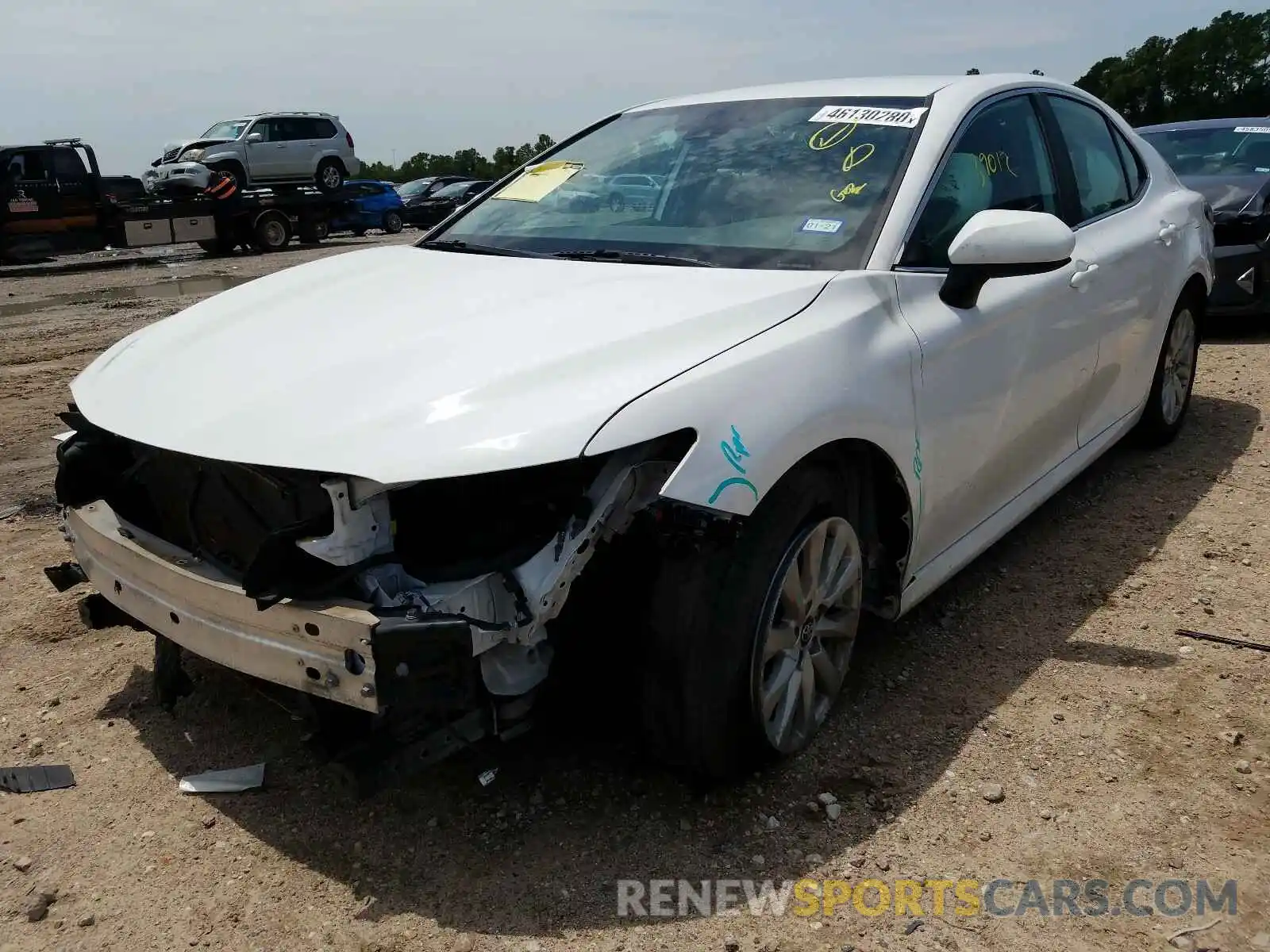 2 Photograph of a damaged car 4T1B11HK5KU197840 TOYOTA CAMRY 2019