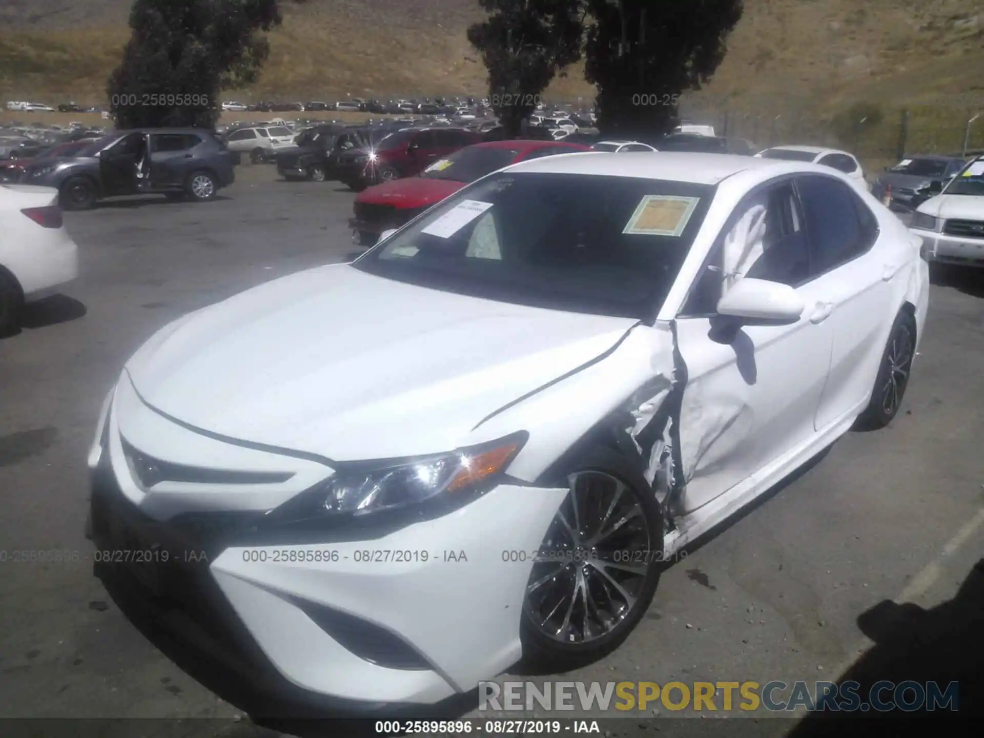 2 Photograph of a damaged car 4T1B11HK5KU199328 TOYOTA CAMRY 2019