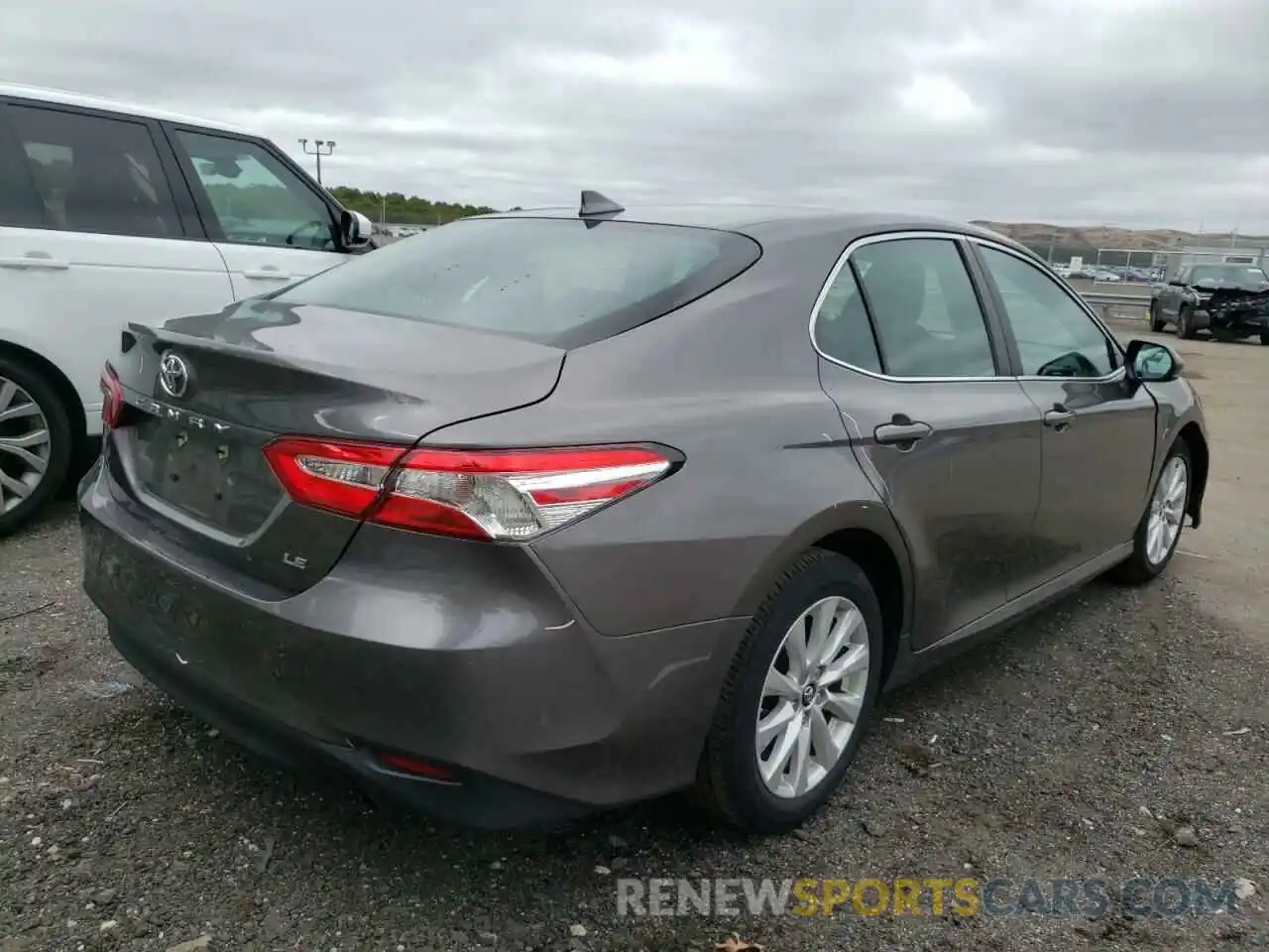 4 Photograph of a damaged car 4T1B11HK5KU203183 TOYOTA CAMRY 2019