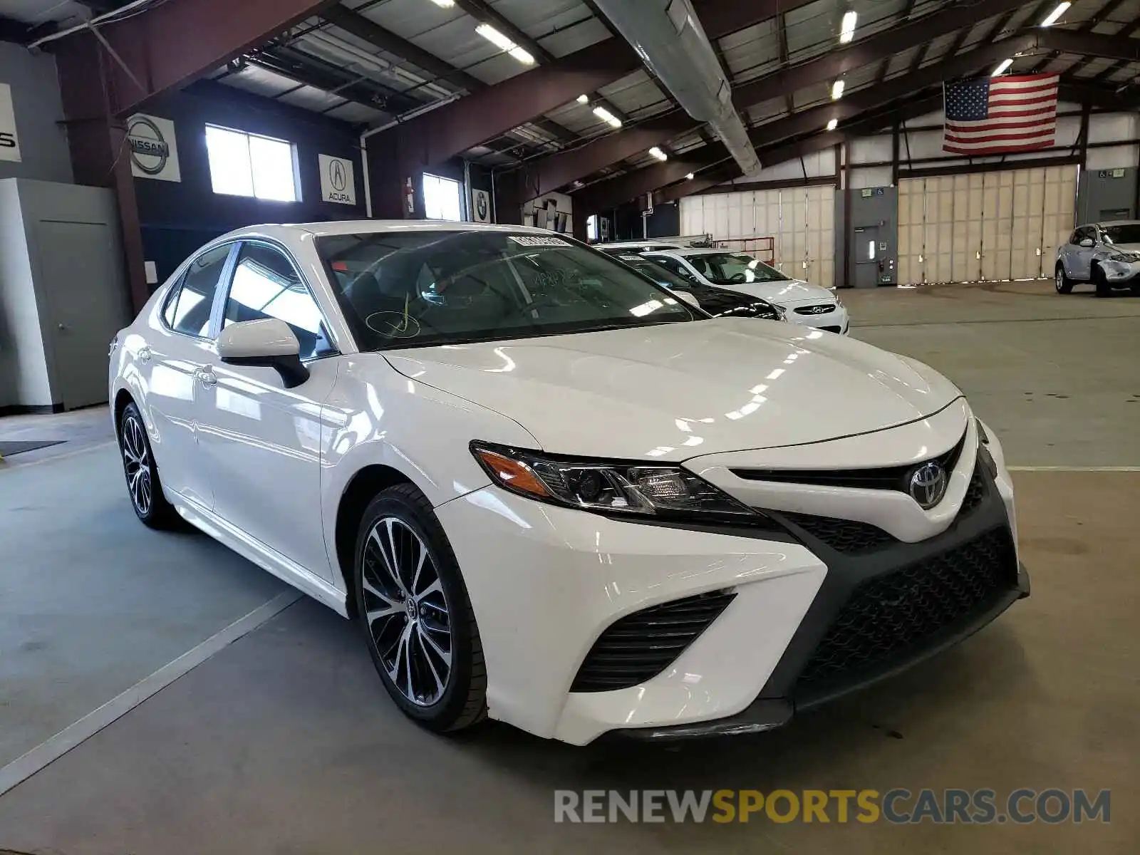 1 Photograph of a damaged car 4T1B11HK5KU205452 TOYOTA CAMRY 2019