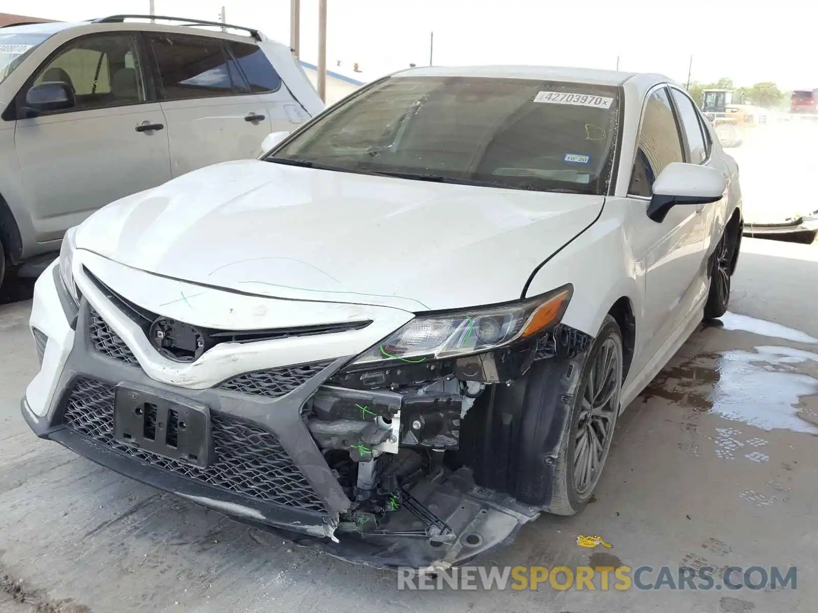 2 Photograph of a damaged car 4T1B11HK5KU206570 TOYOTA CAMRY 2019