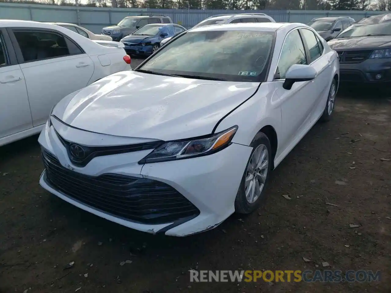 2 Photograph of a damaged car 4T1B11HK5KU207637 TOYOTA CAMRY 2019