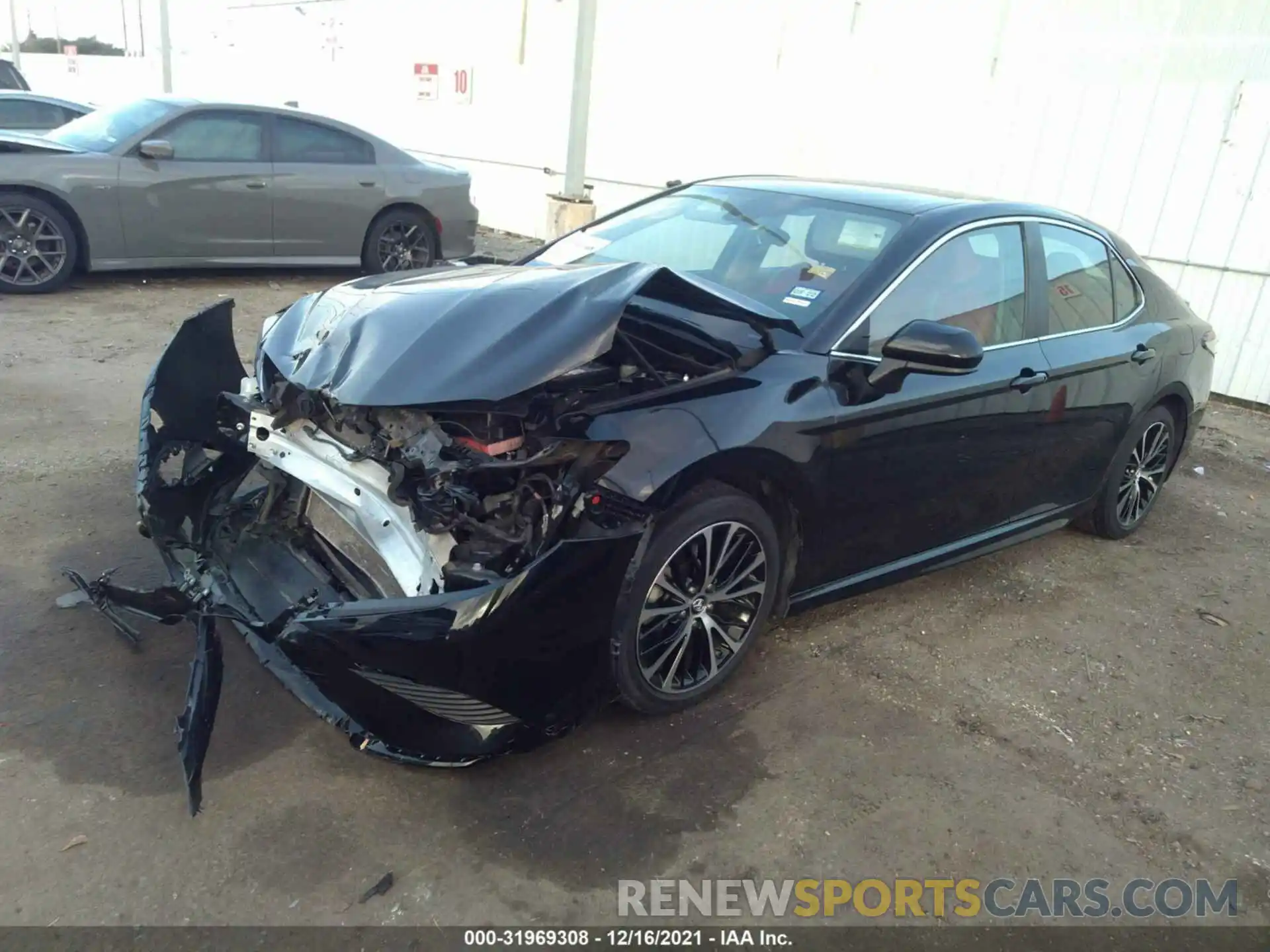 2 Photograph of a damaged car 4T1B11HK5KU208142 TOYOTA CAMRY 2019