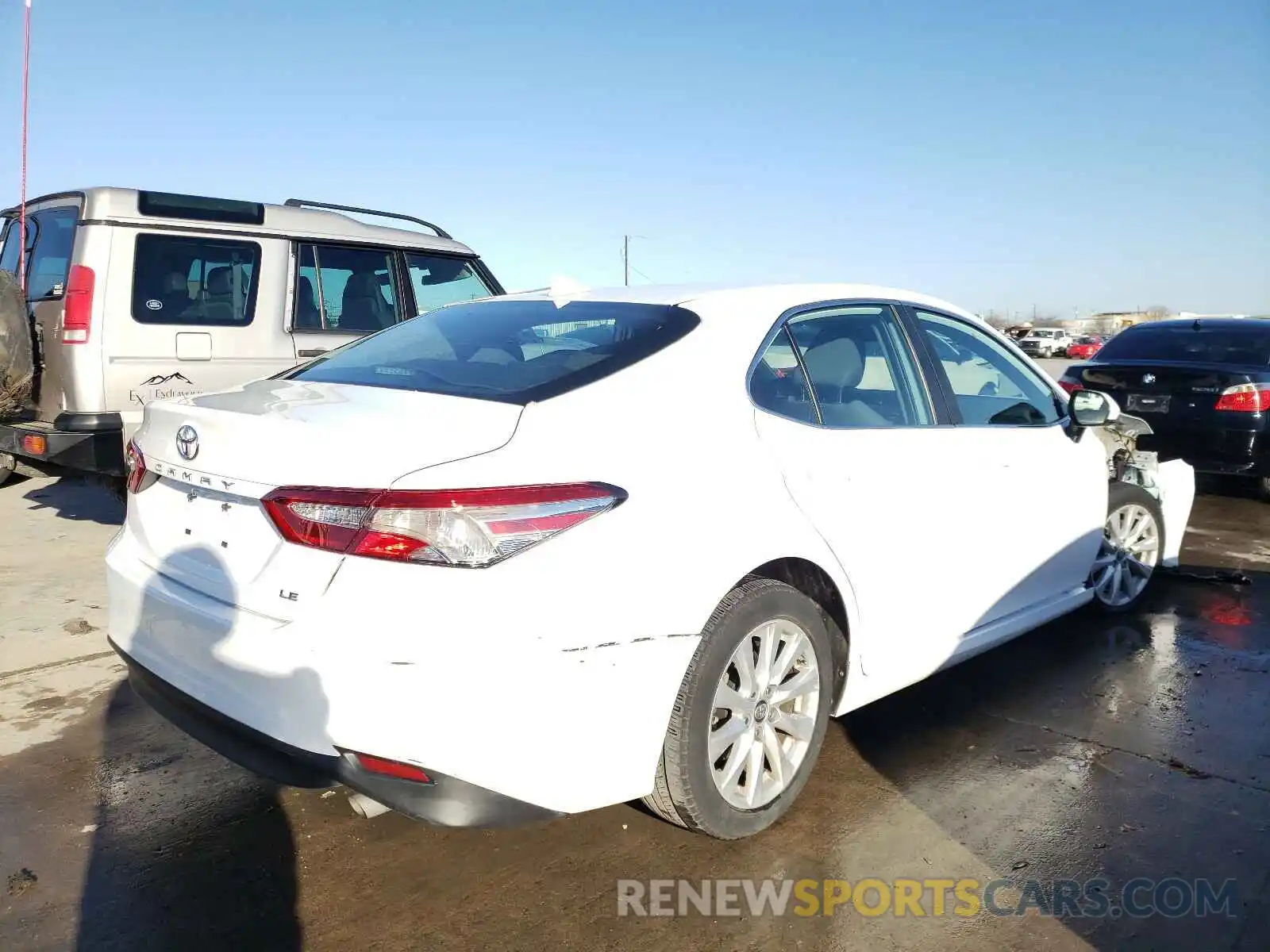 4 Photograph of a damaged car 4T1B11HK5KU211512 TOYOTA CAMRY 2019