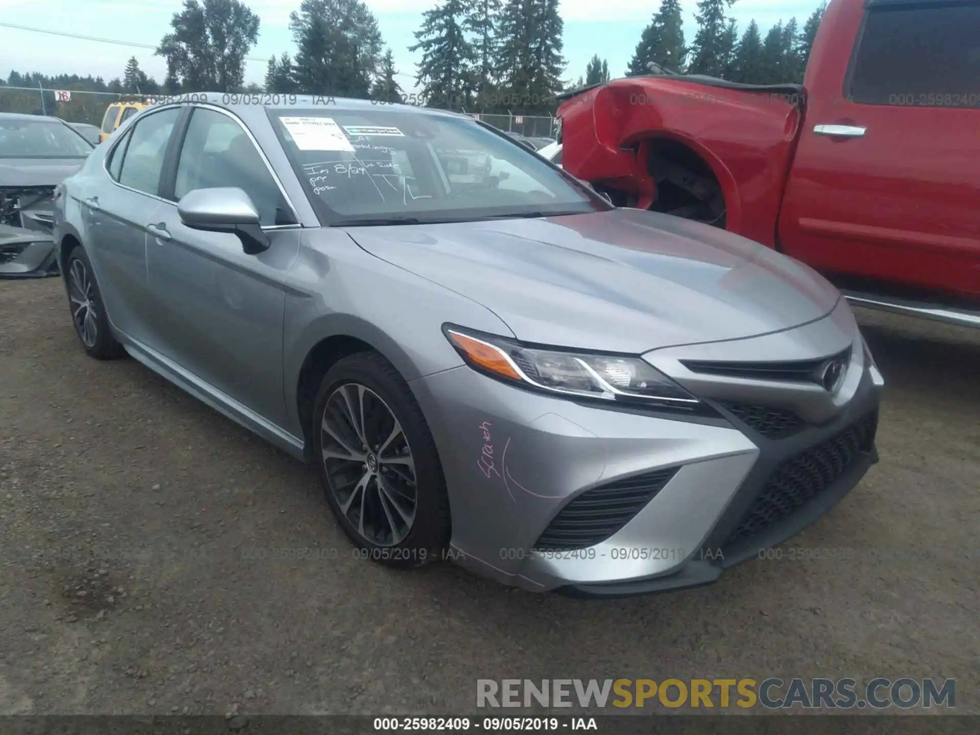 1 Photograph of a damaged car 4T1B11HK5KU212059 TOYOTA CAMRY 2019