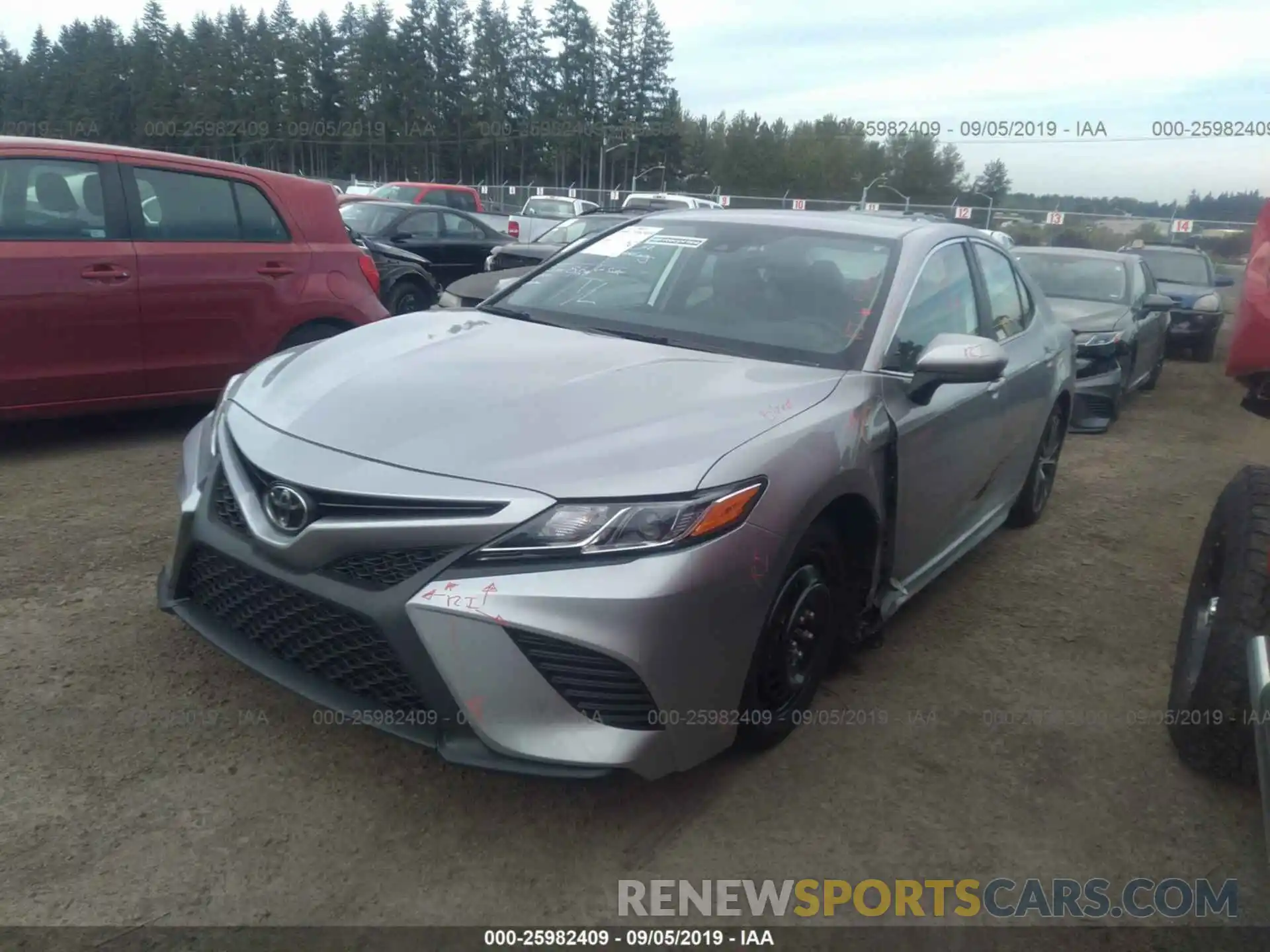 2 Photograph of a damaged car 4T1B11HK5KU212059 TOYOTA CAMRY 2019