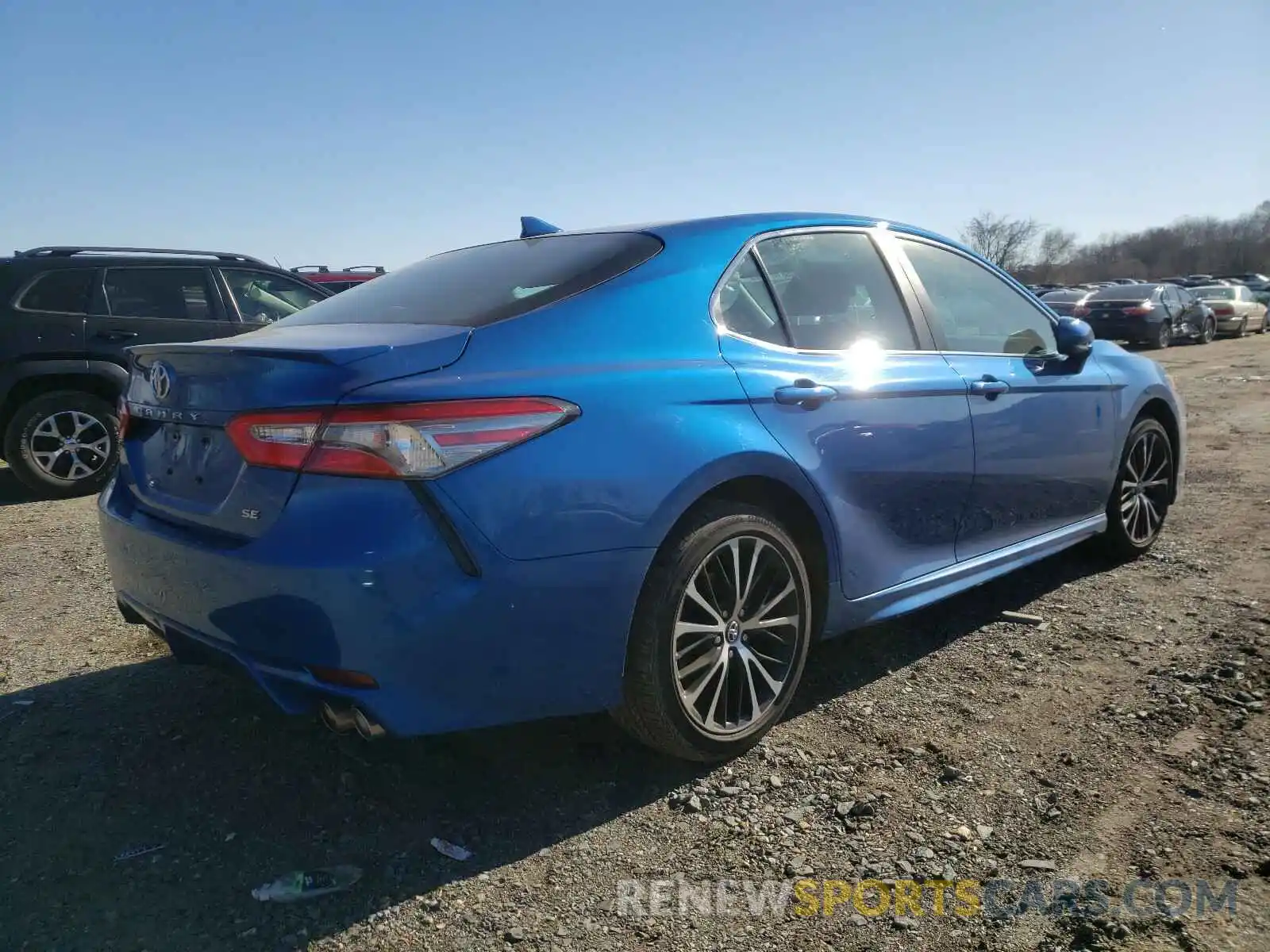 4 Photograph of a damaged car 4T1B11HK5KU215205 TOYOTA CAMRY 2019