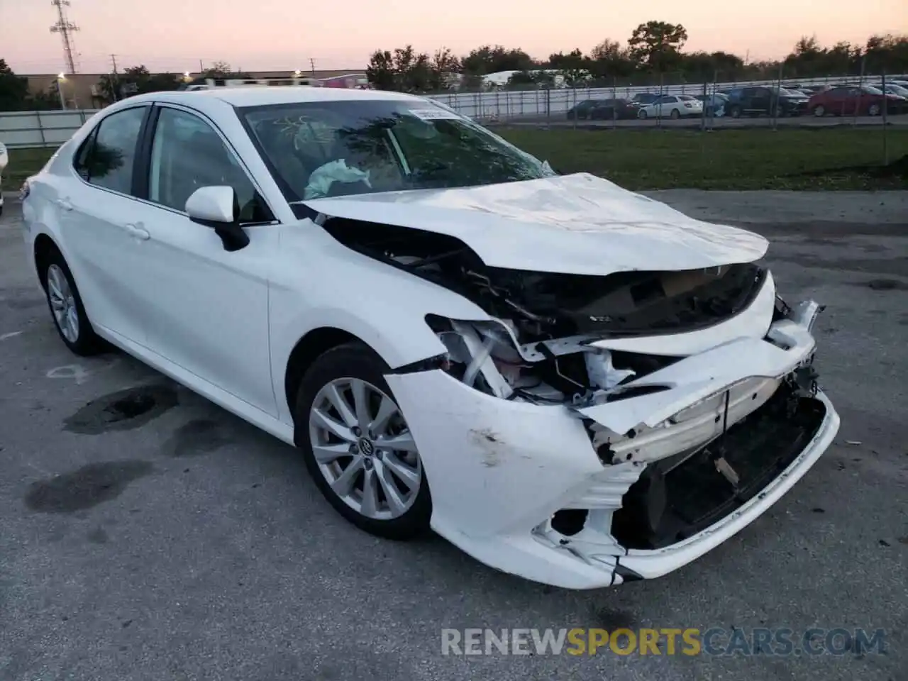 1 Photograph of a damaged car 4T1B11HK5KU223725 TOYOTA CAMRY 2019