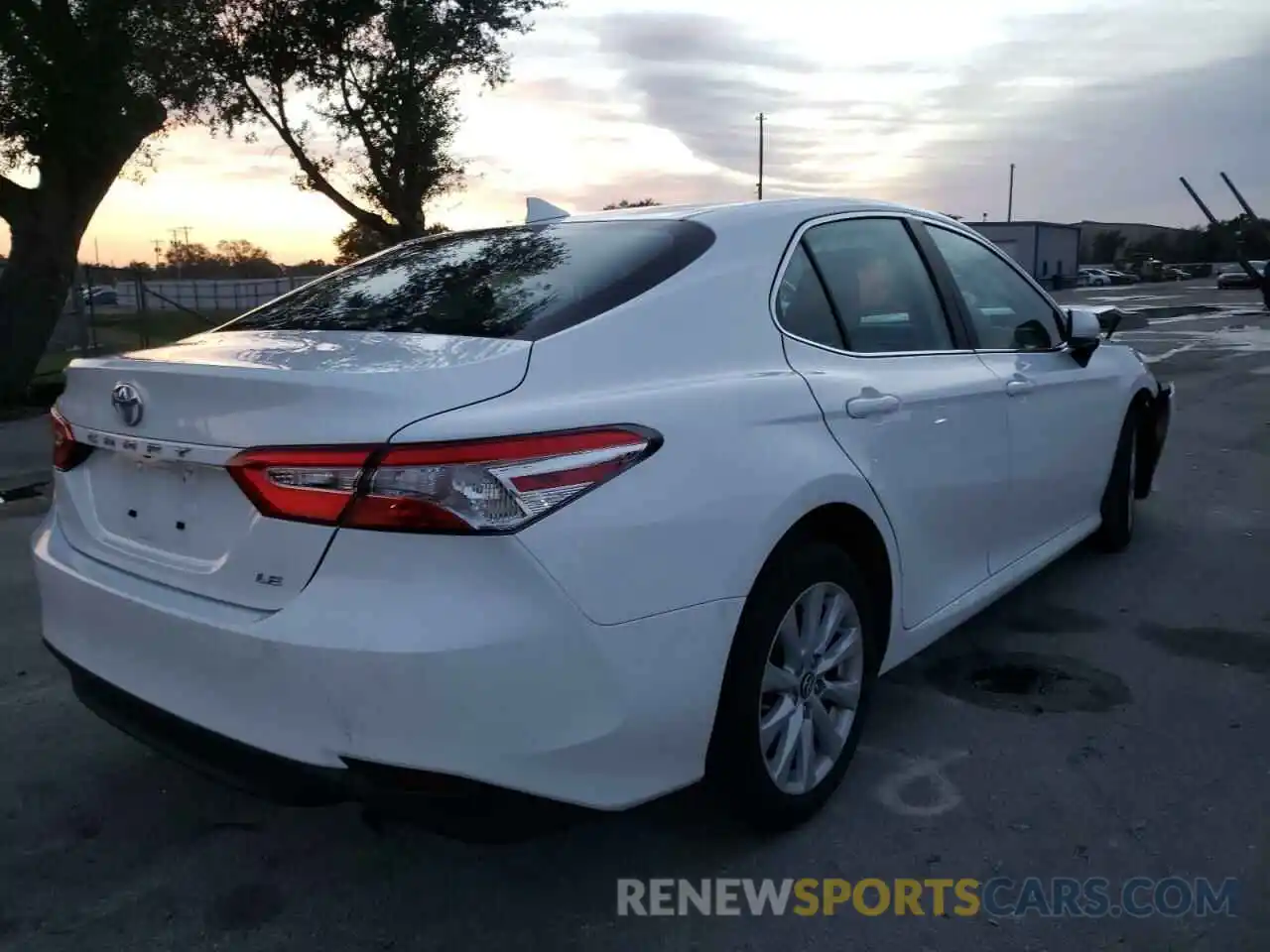 4 Photograph of a damaged car 4T1B11HK5KU223725 TOYOTA CAMRY 2019