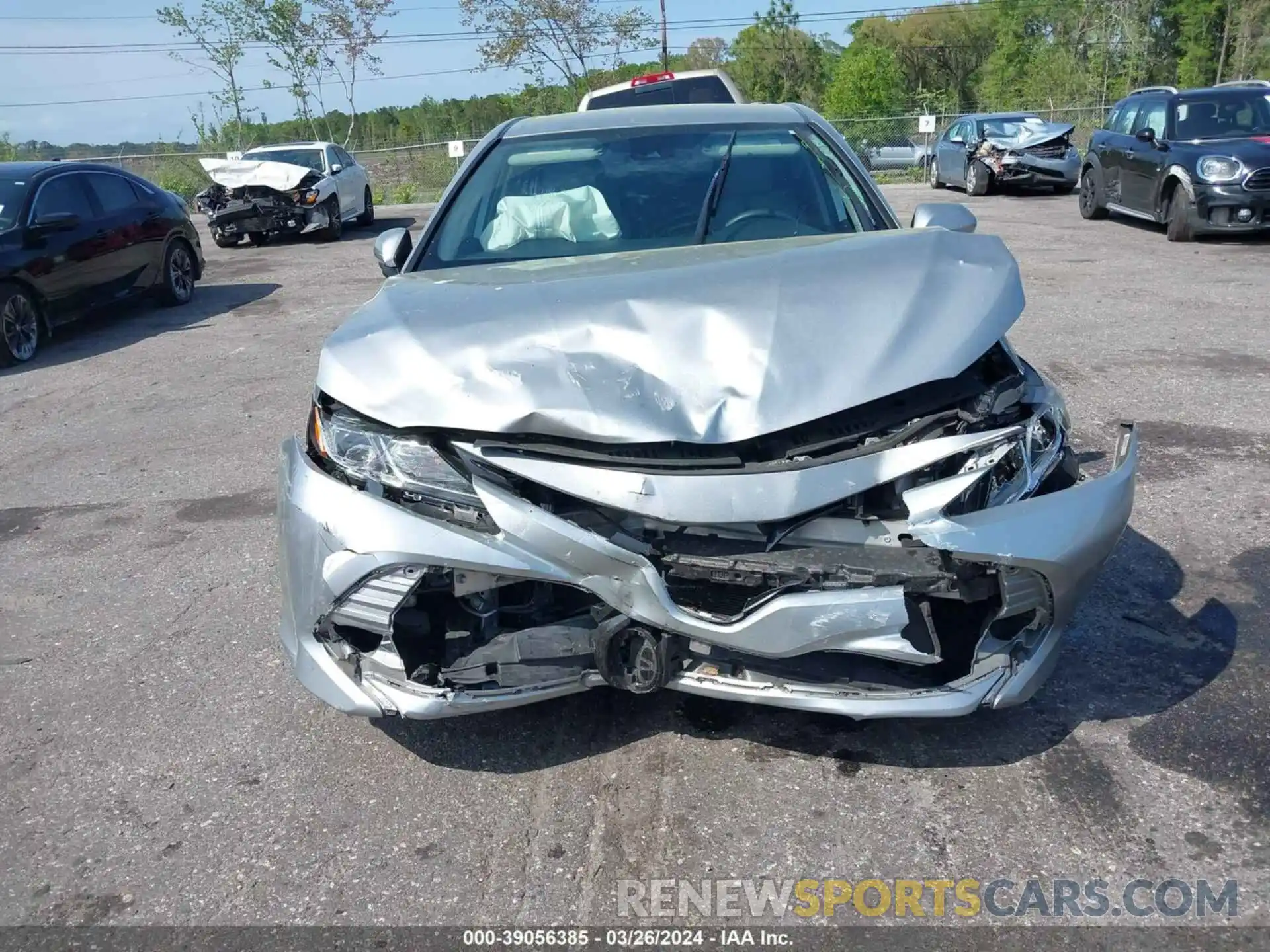 12 Photograph of a damaged car 4T1B11HK5KU224695 TOYOTA CAMRY 2019