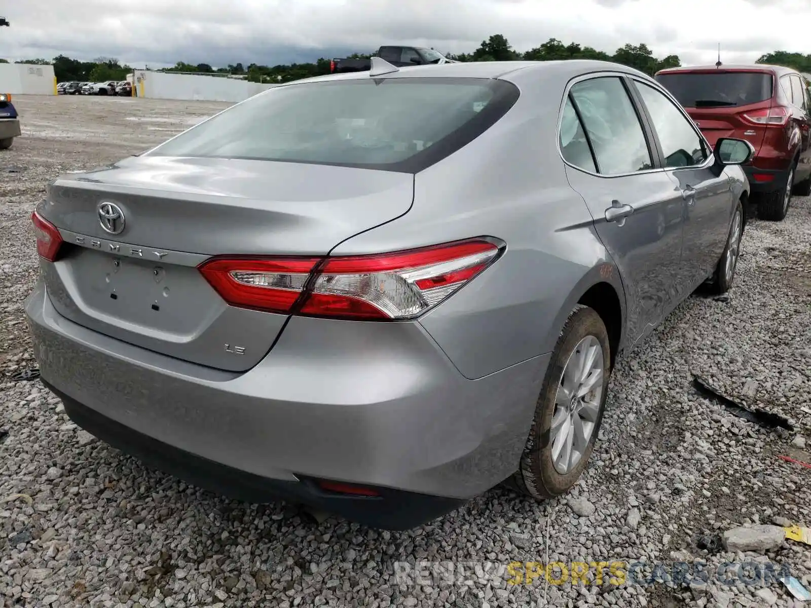 4 Photograph of a damaged car 4T1B11HK5KU225734 TOYOTA CAMRY 2019