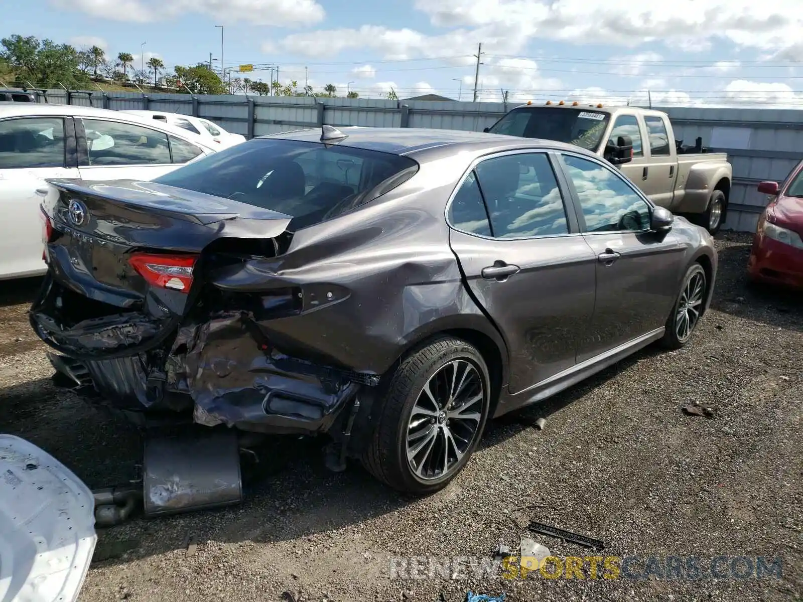 4 Photograph of a damaged car 4T1B11HK5KU230707 TOYOTA CAMRY 2019