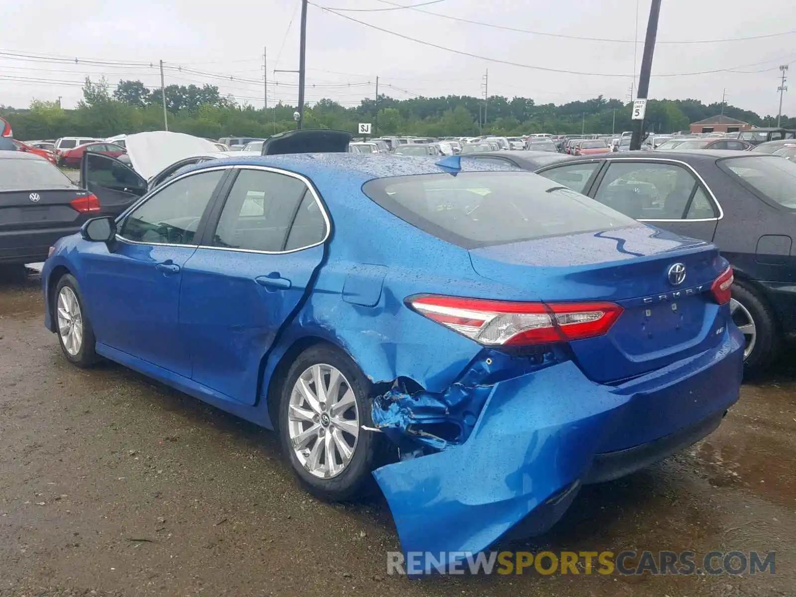 3 Photograph of a damaged car 4T1B11HK5KU230951 TOYOTA CAMRY 2019