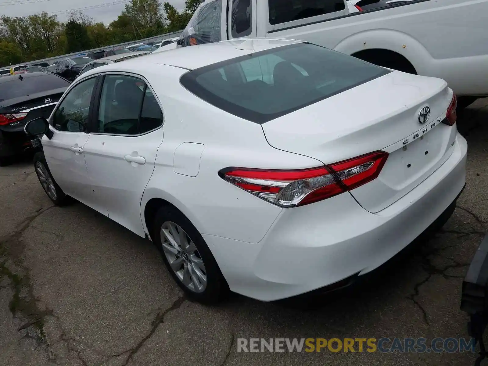 3 Photograph of a damaged car 4T1B11HK5KU231016 TOYOTA CAMRY 2019