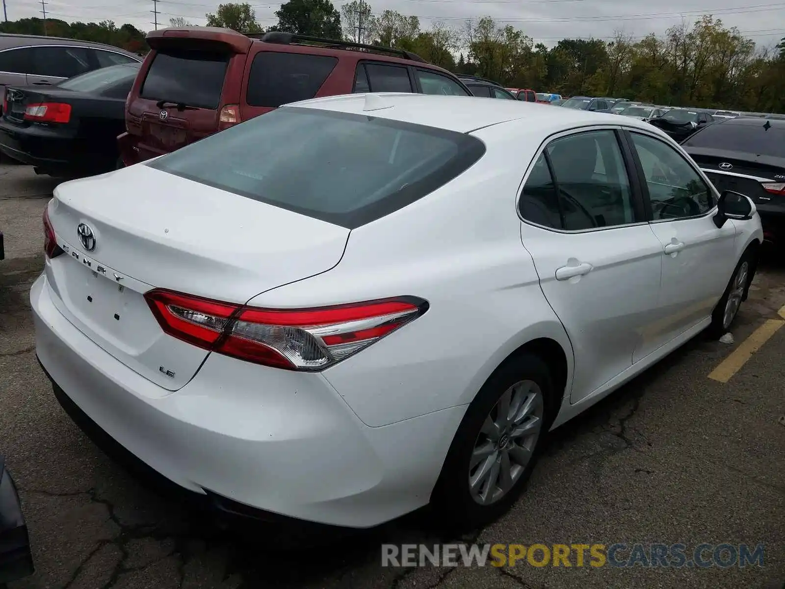 4 Photograph of a damaged car 4T1B11HK5KU231016 TOYOTA CAMRY 2019