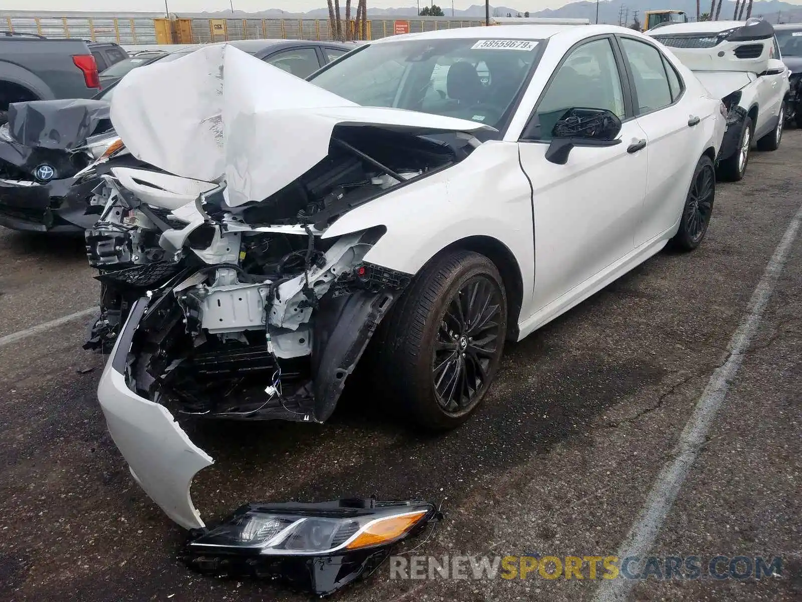 2 Photograph of a damaged car 4T1B11HK5KU237964 TOYOTA CAMRY 2019