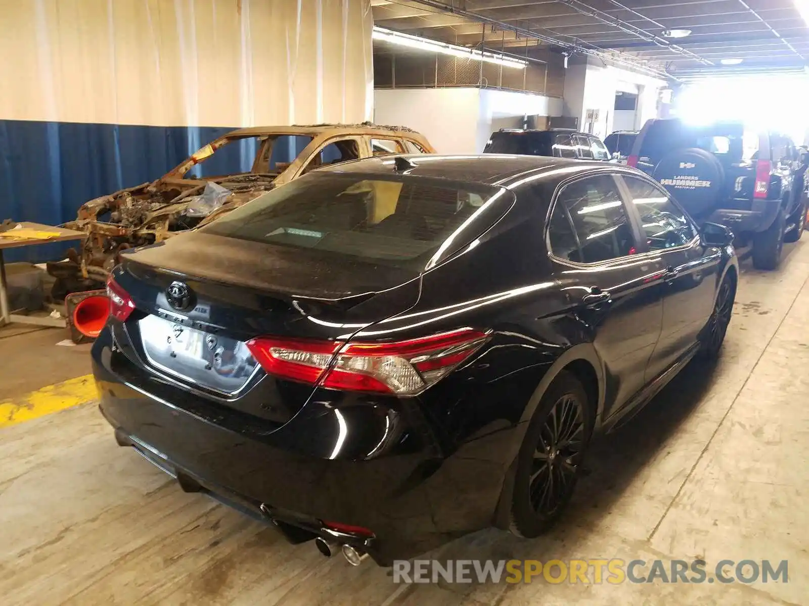 4 Photograph of a damaged car 4T1B11HK5KU238337 TOYOTA CAMRY 2019