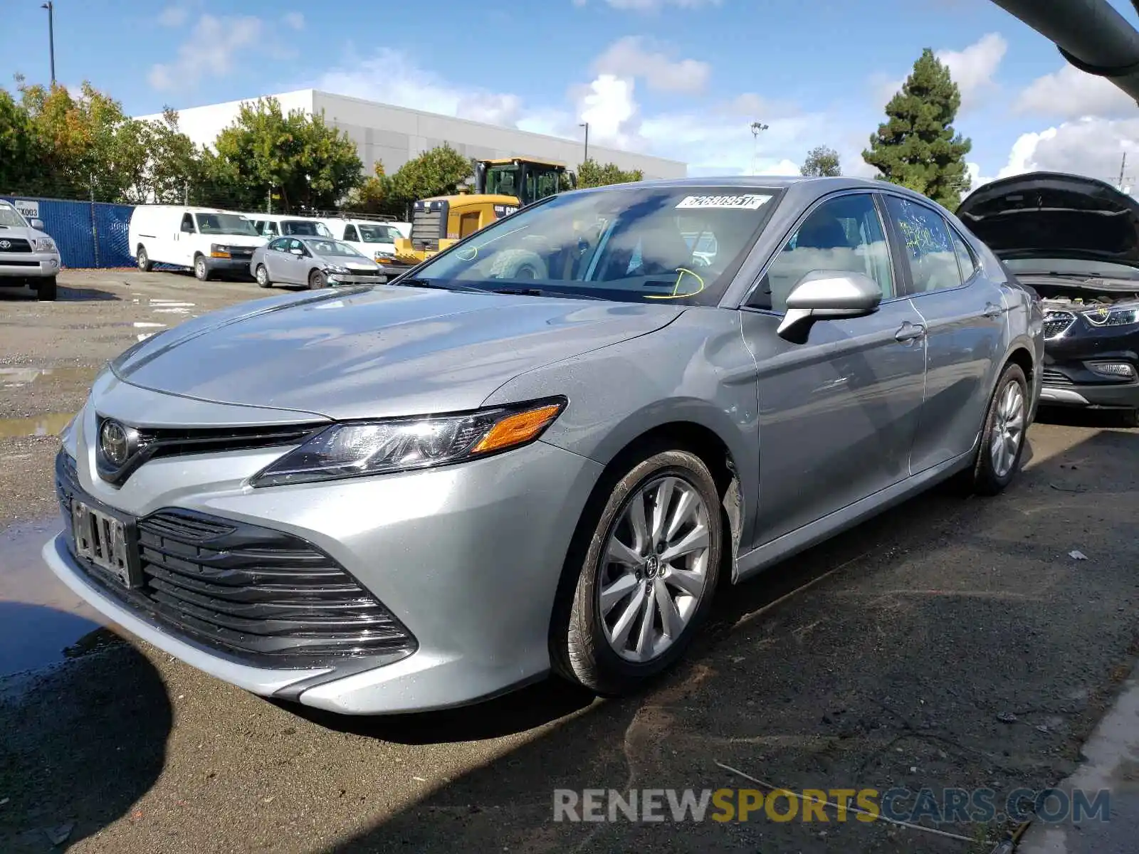 2 Photograph of a damaged car 4T1B11HK5KU242100 TOYOTA CAMRY 2019