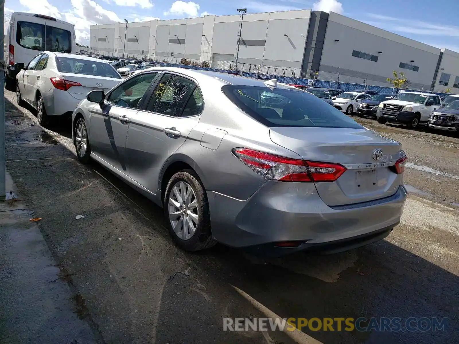 3 Photograph of a damaged car 4T1B11HK5KU242100 TOYOTA CAMRY 2019