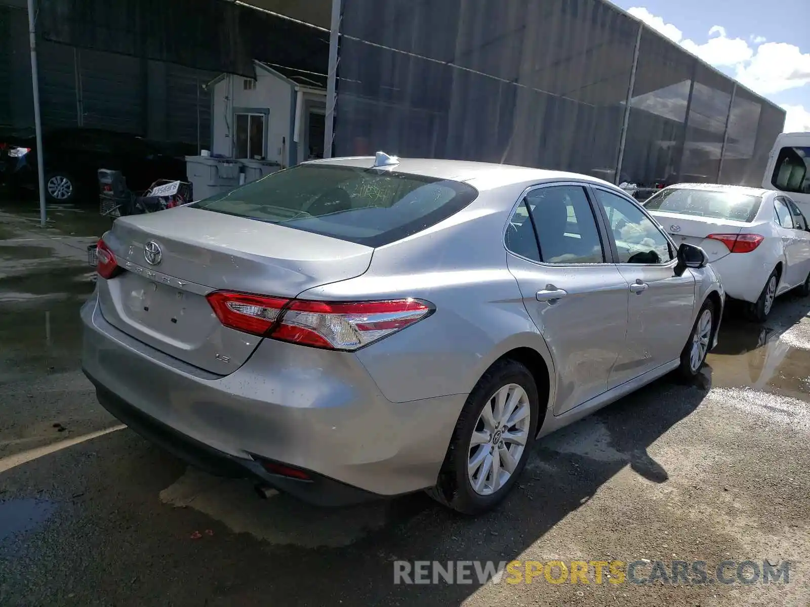 4 Photograph of a damaged car 4T1B11HK5KU242100 TOYOTA CAMRY 2019