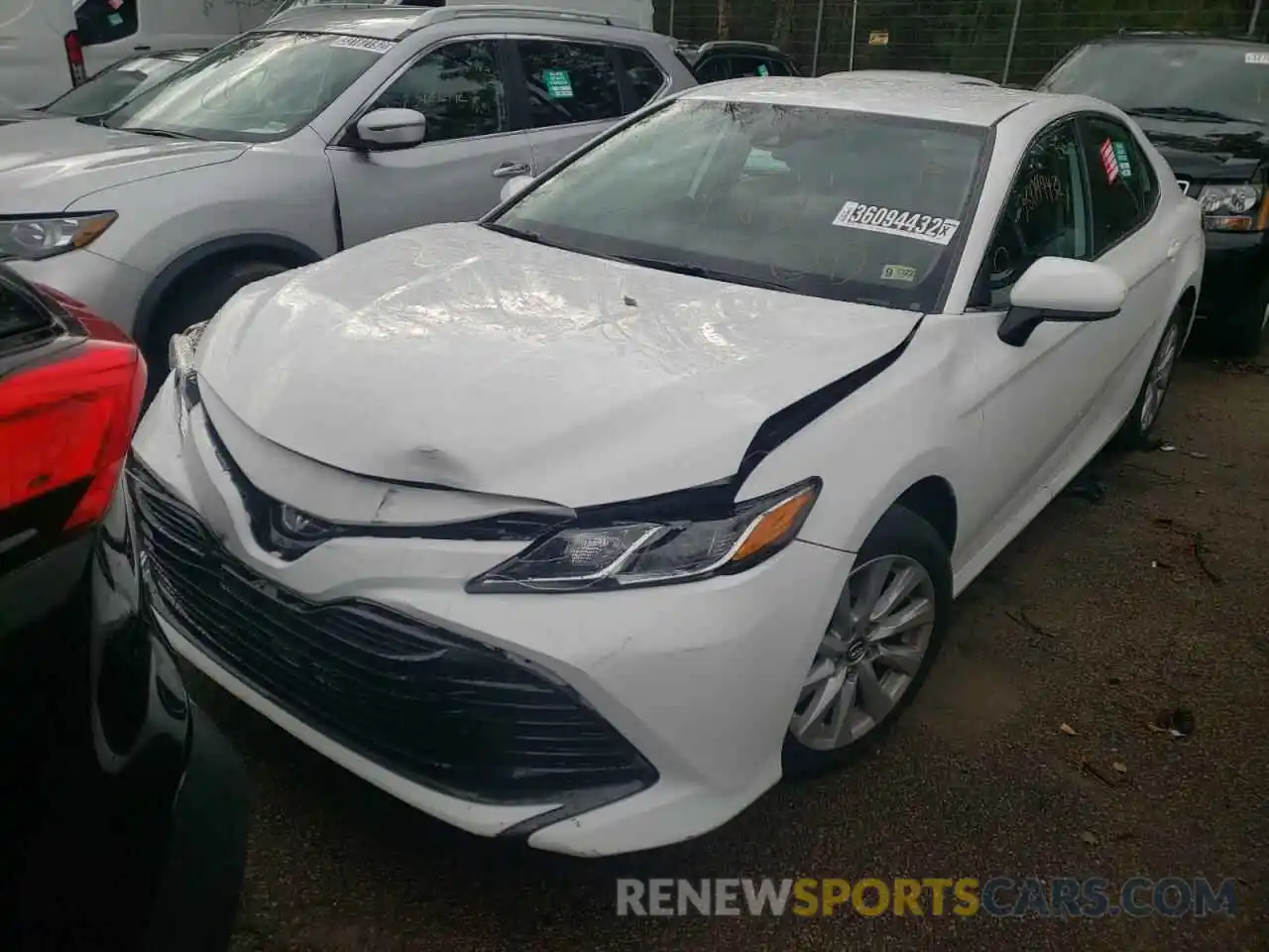 2 Photograph of a damaged car 4T1B11HK5KU242548 TOYOTA CAMRY 2019