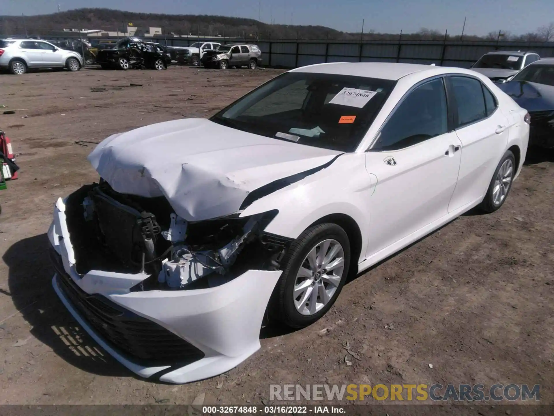 2 Photograph of a damaged car 4T1B11HK5KU242856 TOYOTA CAMRY 2019