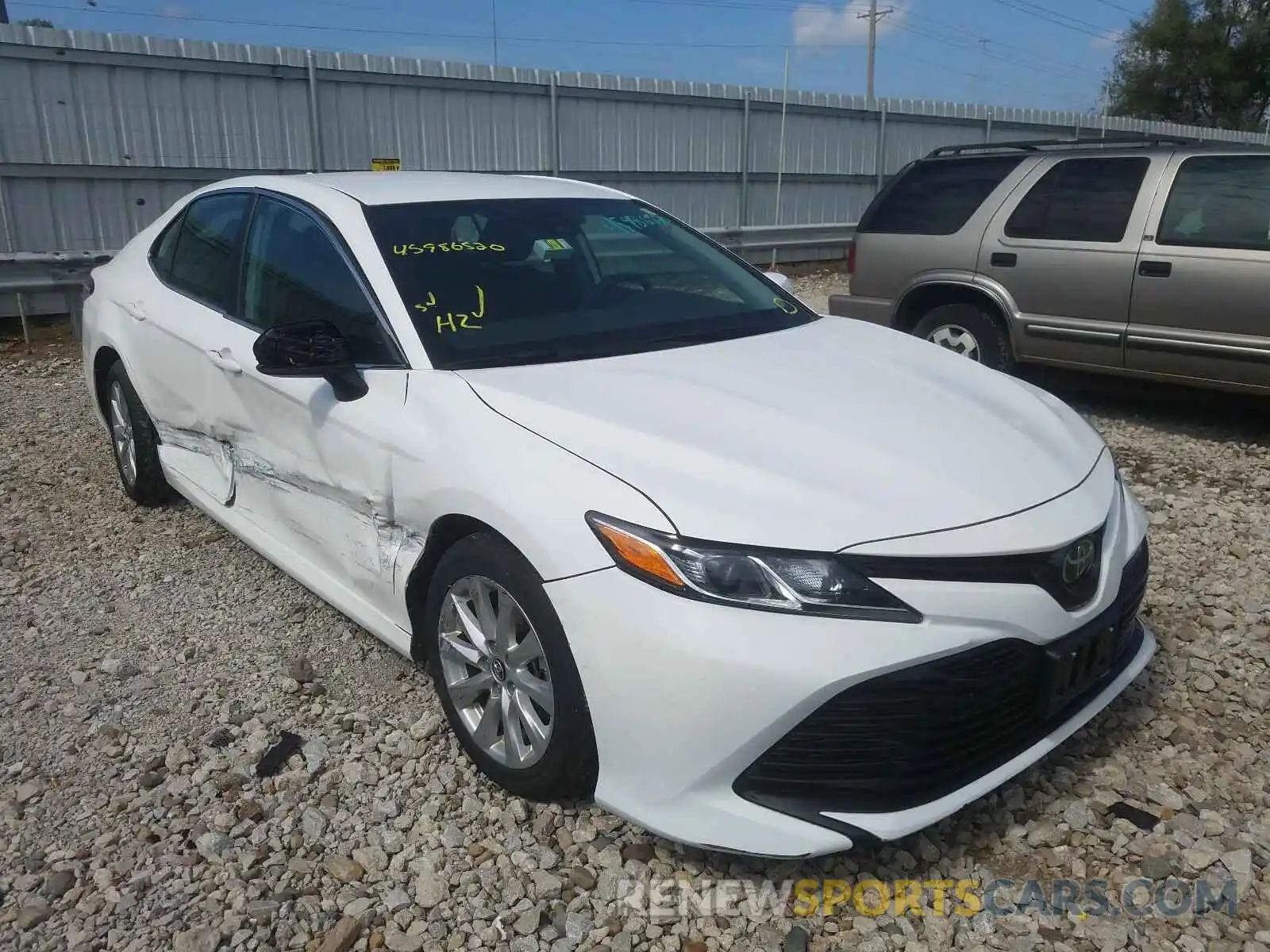 1 Photograph of a damaged car 4T1B11HK5KU242887 TOYOTA CAMRY 2019