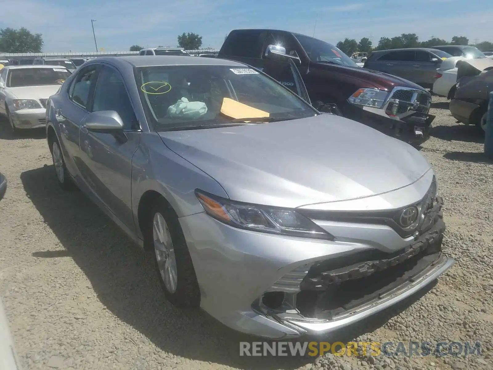 1 Photograph of a damaged car 4T1B11HK5KU243232 TOYOTA CAMRY 2019