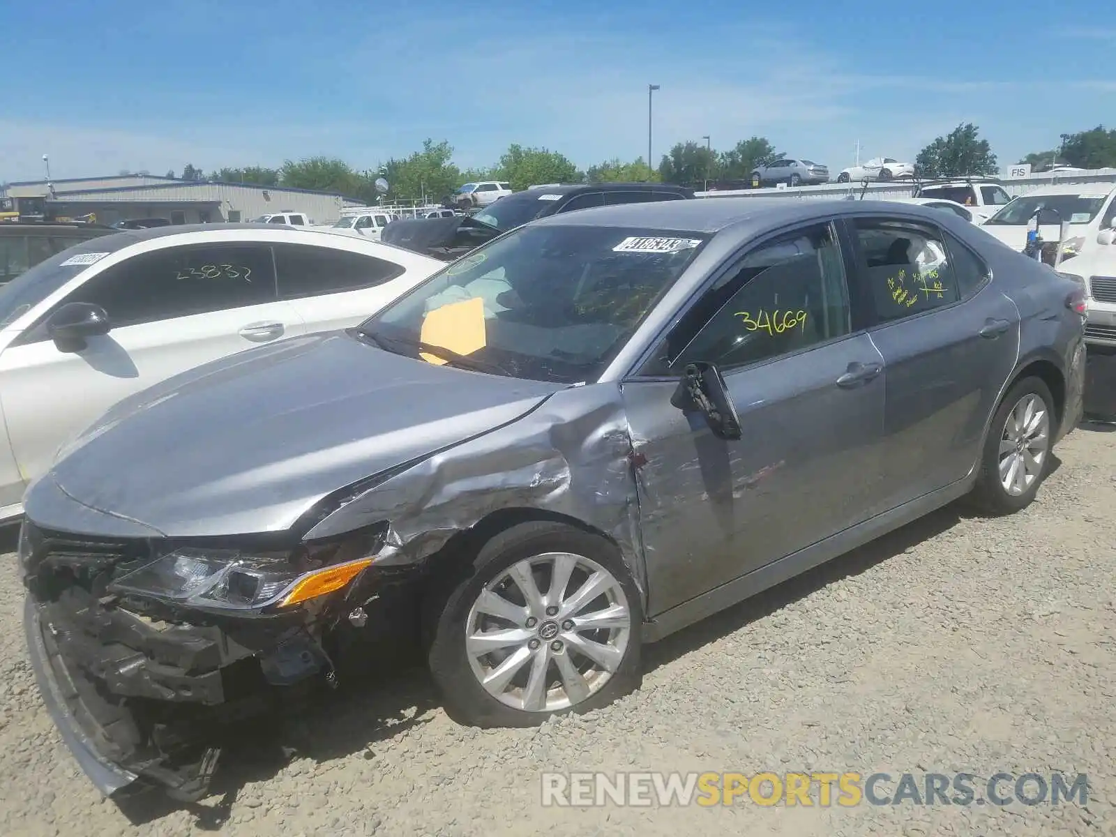 2 Photograph of a damaged car 4T1B11HK5KU243232 TOYOTA CAMRY 2019