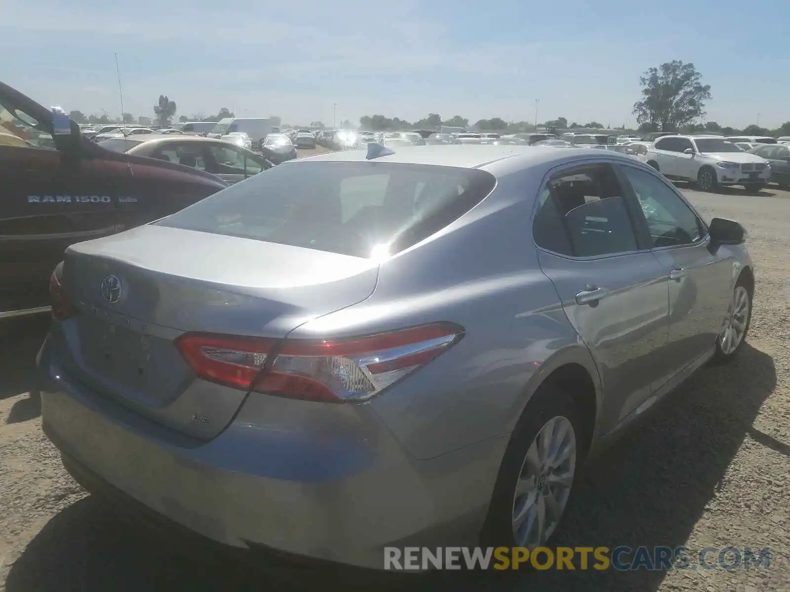 4 Photograph of a damaged car 4T1B11HK5KU243232 TOYOTA CAMRY 2019