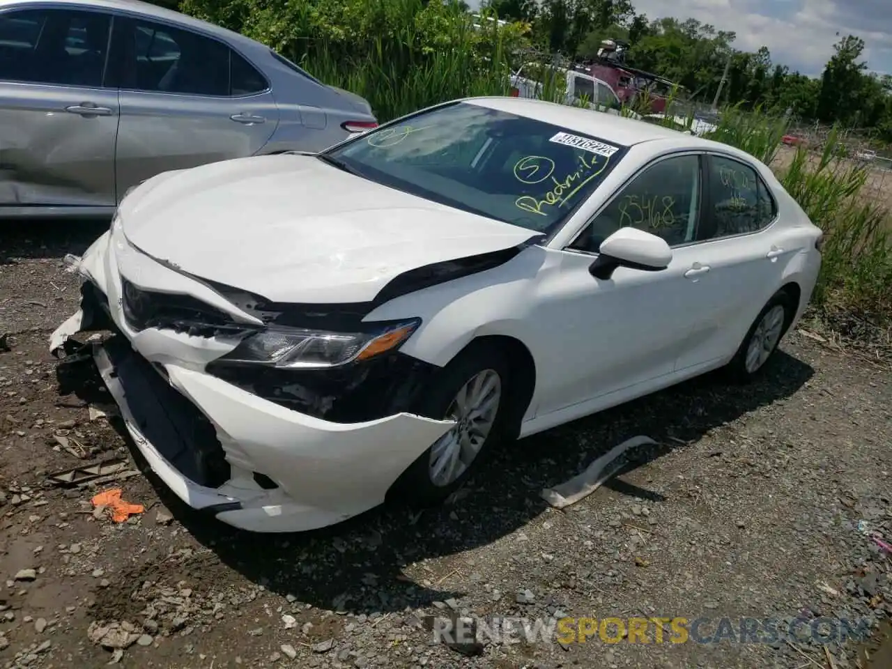 2 Photograph of a damaged car 4T1B11HK5KU243392 TOYOTA CAMRY 2019