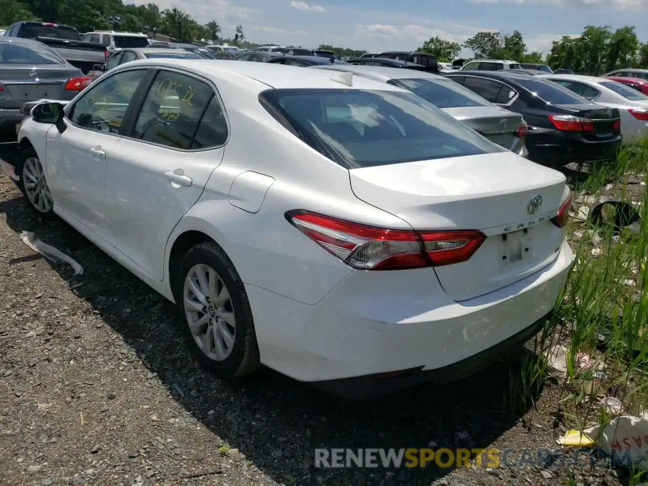 3 Photograph of a damaged car 4T1B11HK5KU243392 TOYOTA CAMRY 2019