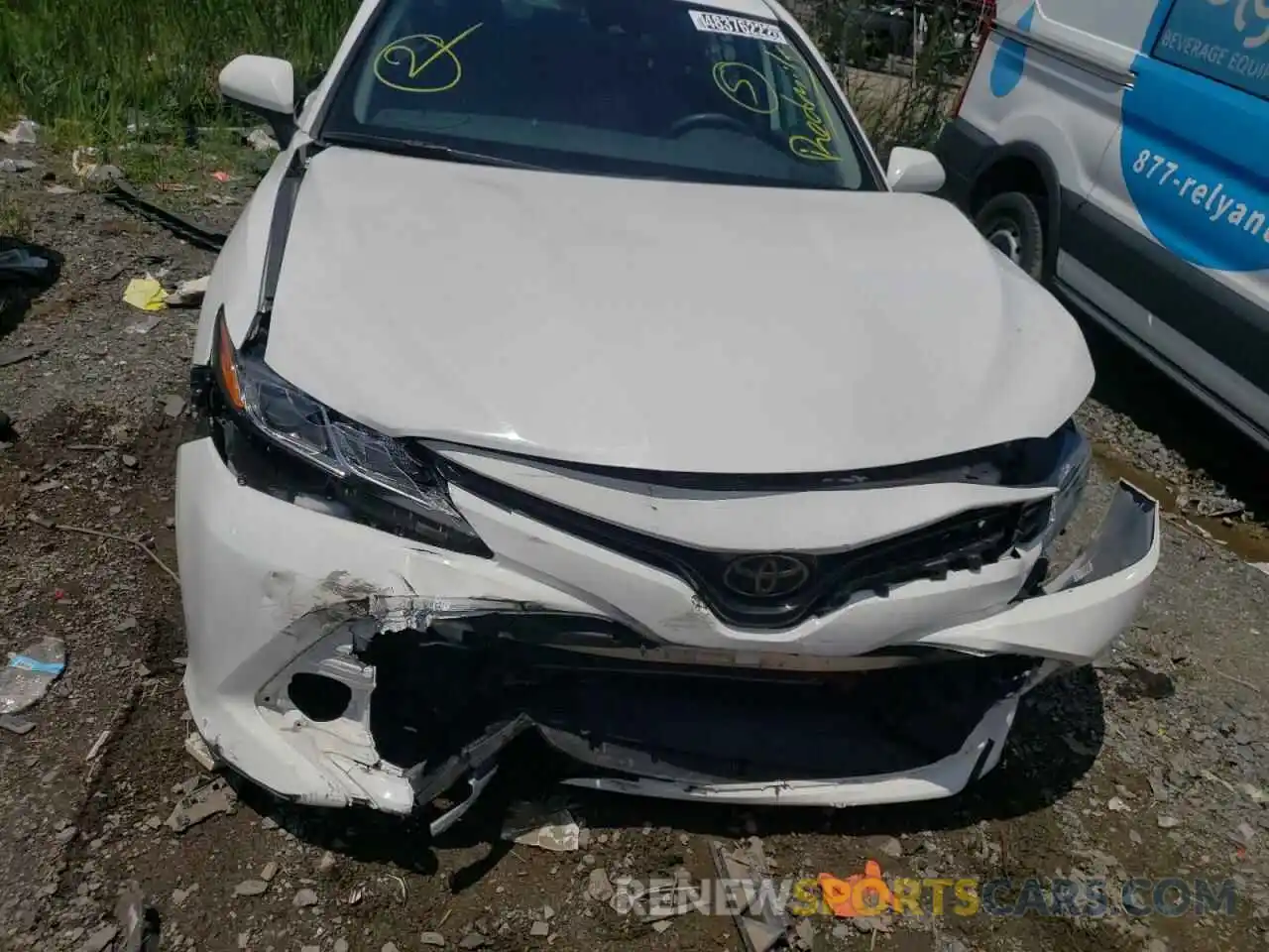 7 Photograph of a damaged car 4T1B11HK5KU243392 TOYOTA CAMRY 2019