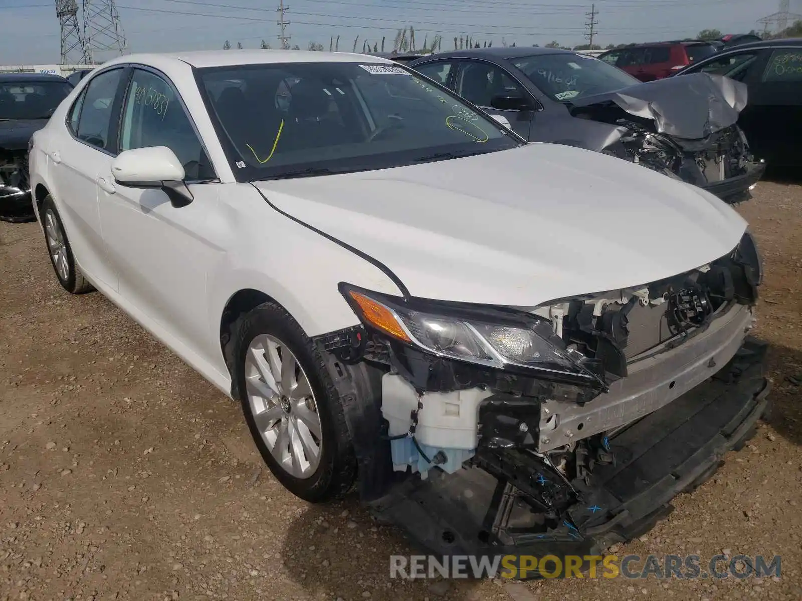 1 Photograph of a damaged car 4T1B11HK5KU243831 TOYOTA CAMRY 2019