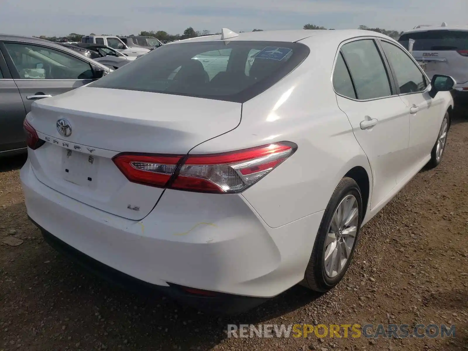 4 Photograph of a damaged car 4T1B11HK5KU243831 TOYOTA CAMRY 2019