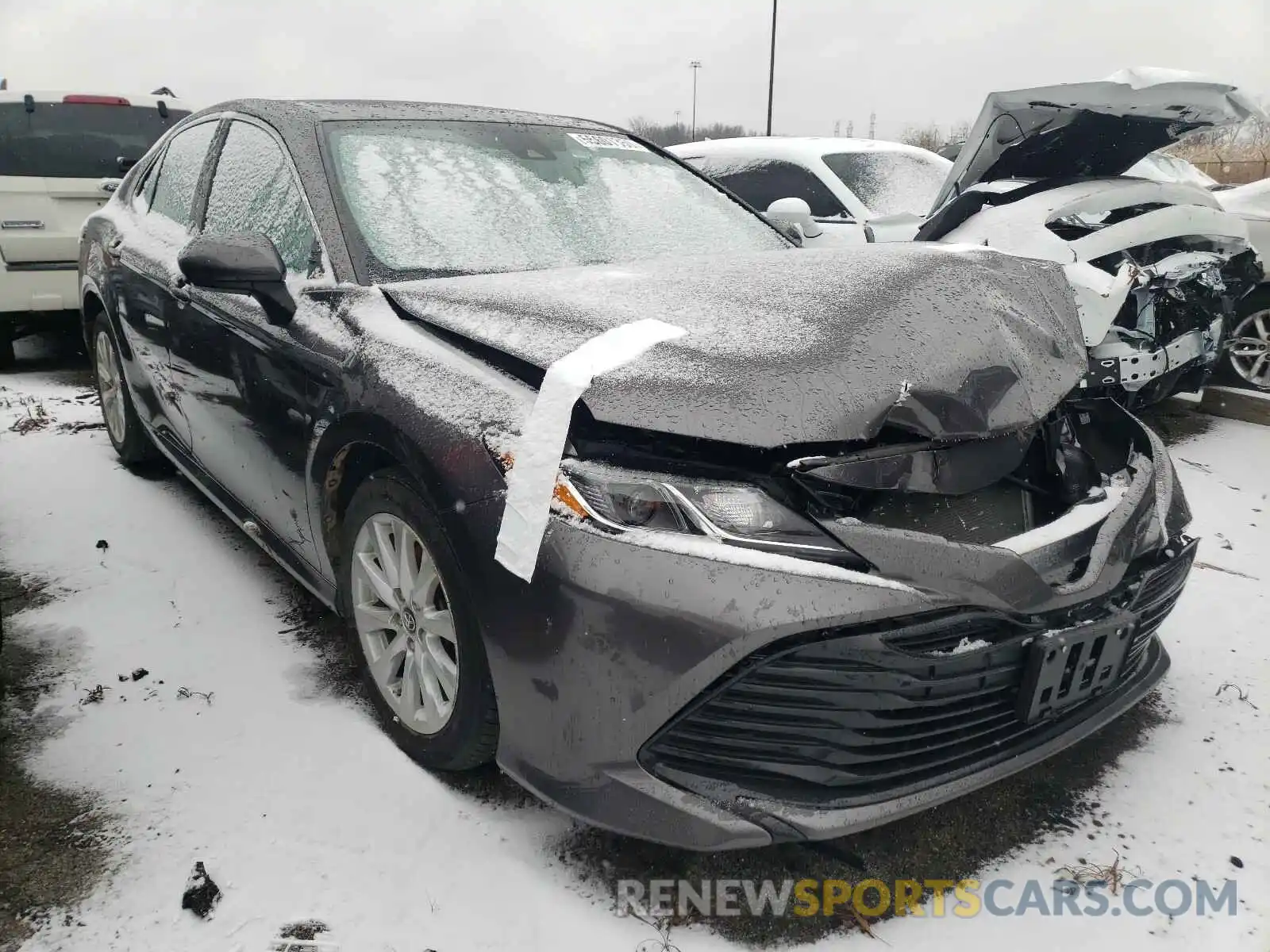 1 Photograph of a damaged car 4T1B11HK5KU243876 TOYOTA CAMRY 2019