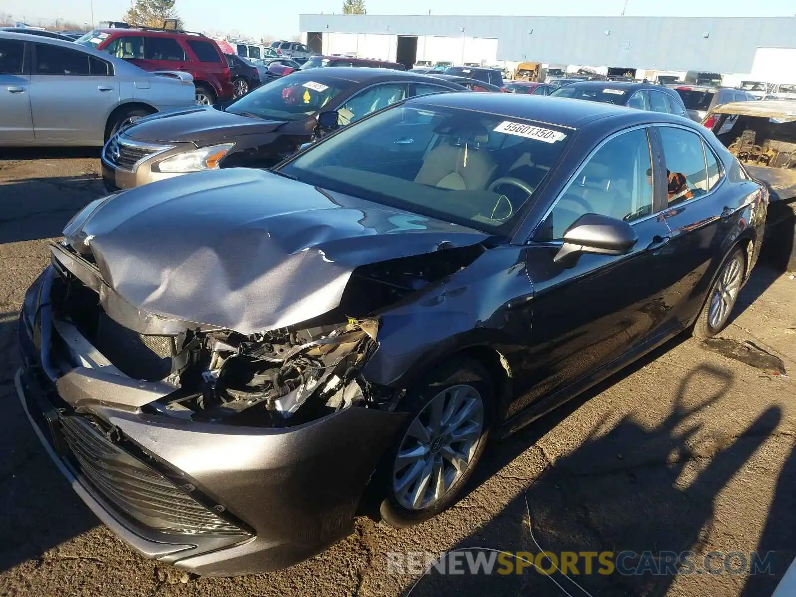 2 Photograph of a damaged car 4T1B11HK5KU243876 TOYOTA CAMRY 2019