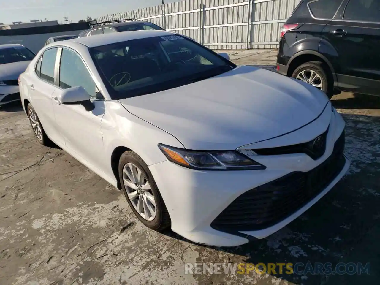 1 Photograph of a damaged car 4T1B11HK5KU243991 TOYOTA CAMRY 2019