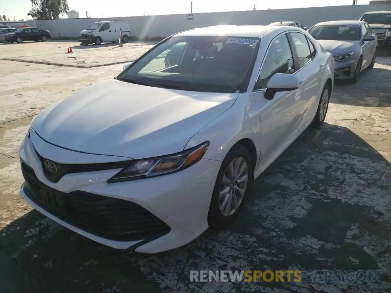 2 Photograph of a damaged car 4T1B11HK5KU243991 TOYOTA CAMRY 2019