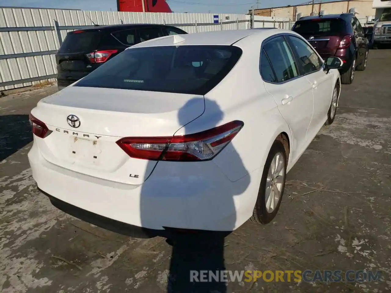 4 Photograph of a damaged car 4T1B11HK5KU243991 TOYOTA CAMRY 2019