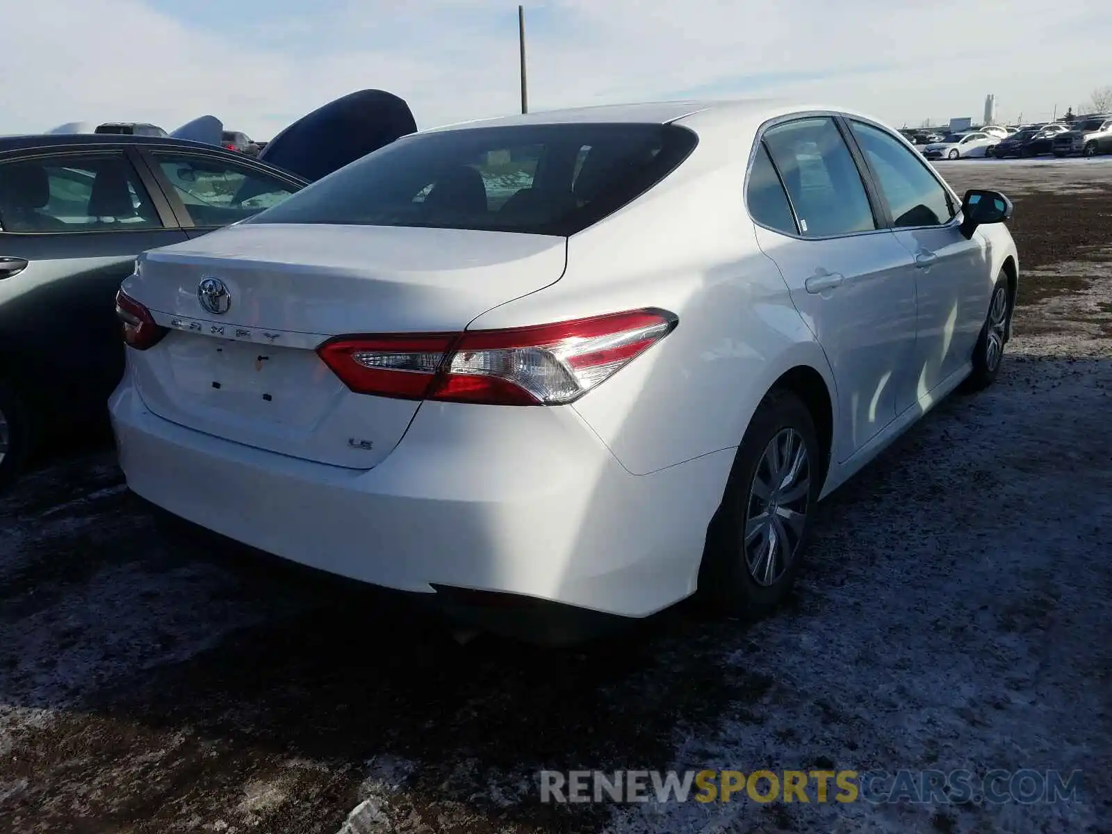 4 Photograph of a damaged car 4T1B11HK5KU244705 TOYOTA CAMRY 2019