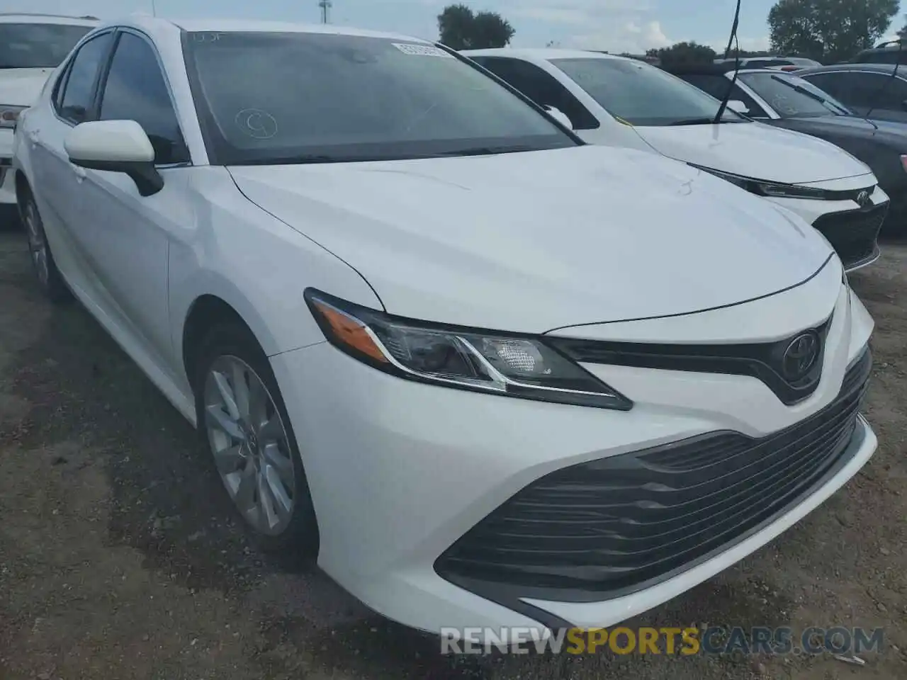 1 Photograph of a damaged car 4T1B11HK5KU244784 TOYOTA CAMRY 2019