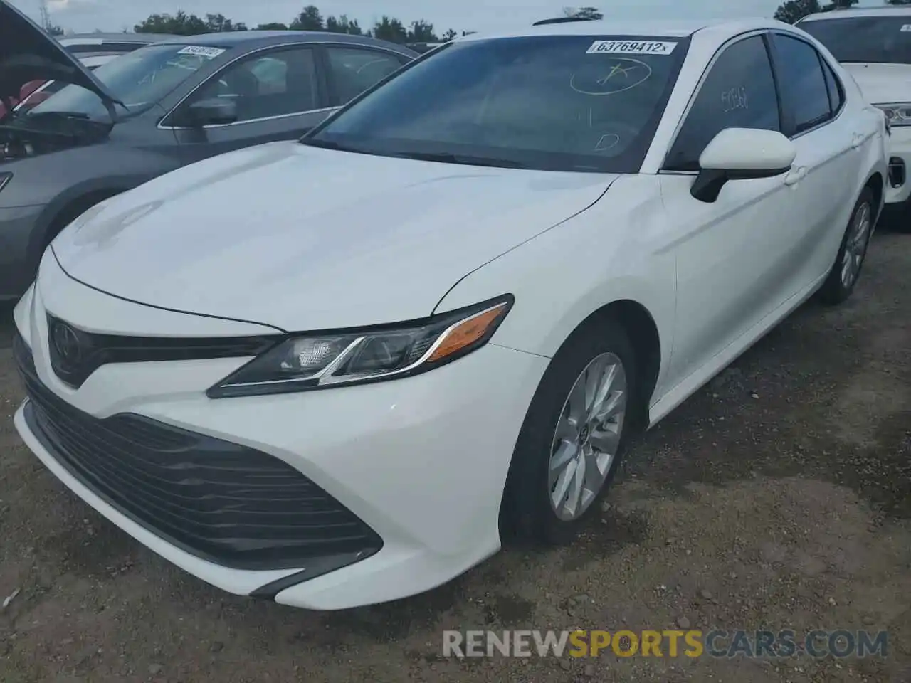 2 Photograph of a damaged car 4T1B11HK5KU244784 TOYOTA CAMRY 2019