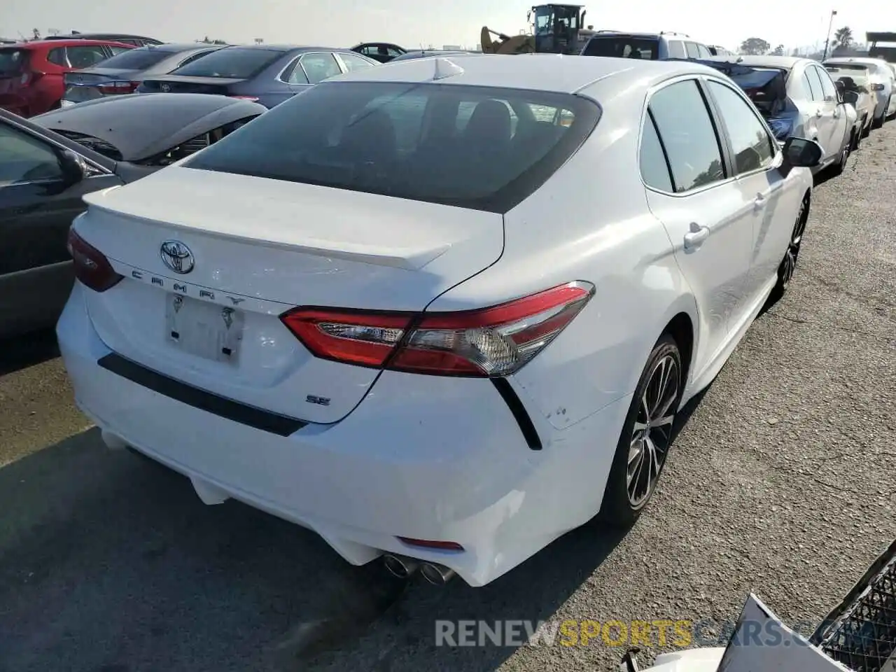 4 Photograph of a damaged car 4T1B11HK5KU249239 TOYOTA CAMRY 2019