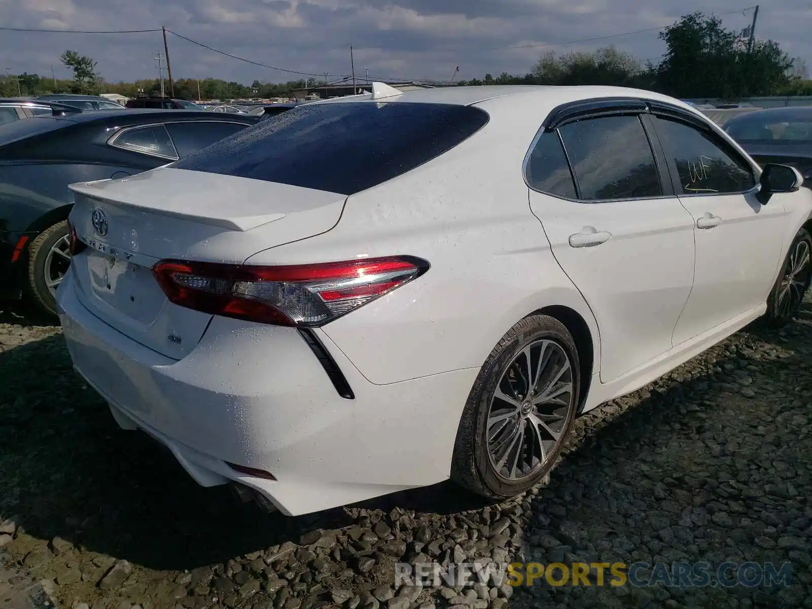 4 Photograph of a damaged car 4T1B11HK5KU251573 TOYOTA CAMRY 2019