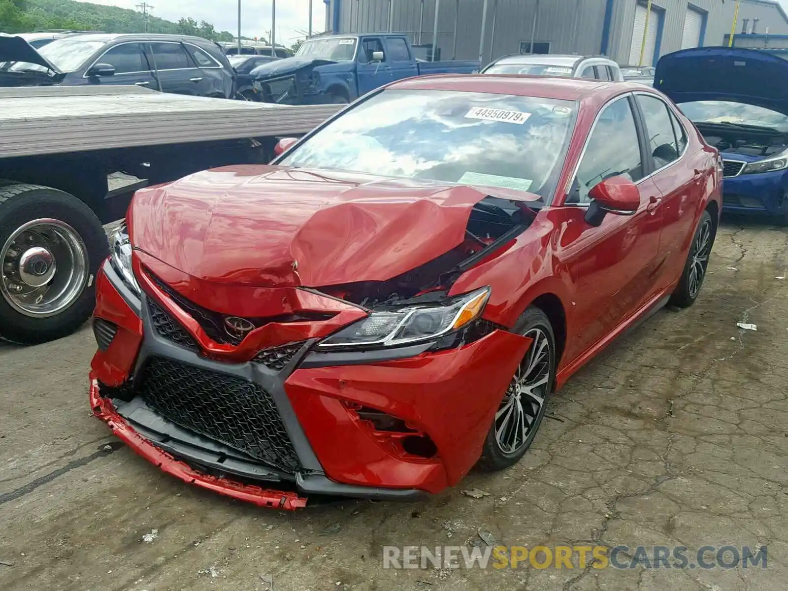 2 Photograph of a damaged car 4T1B11HK5KU256143 TOYOTA CAMRY 2019