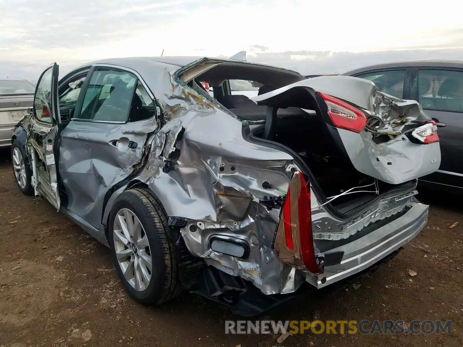 3 Photograph of a damaged car 4T1B11HK5KU257275 TOYOTA CAMRY 2019