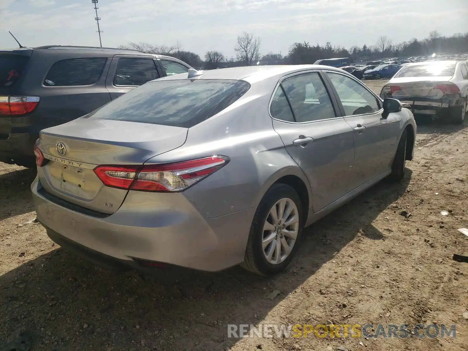 4 Photograph of a damaged car 4T1B11HK5KU257812 TOYOTA CAMRY 2019