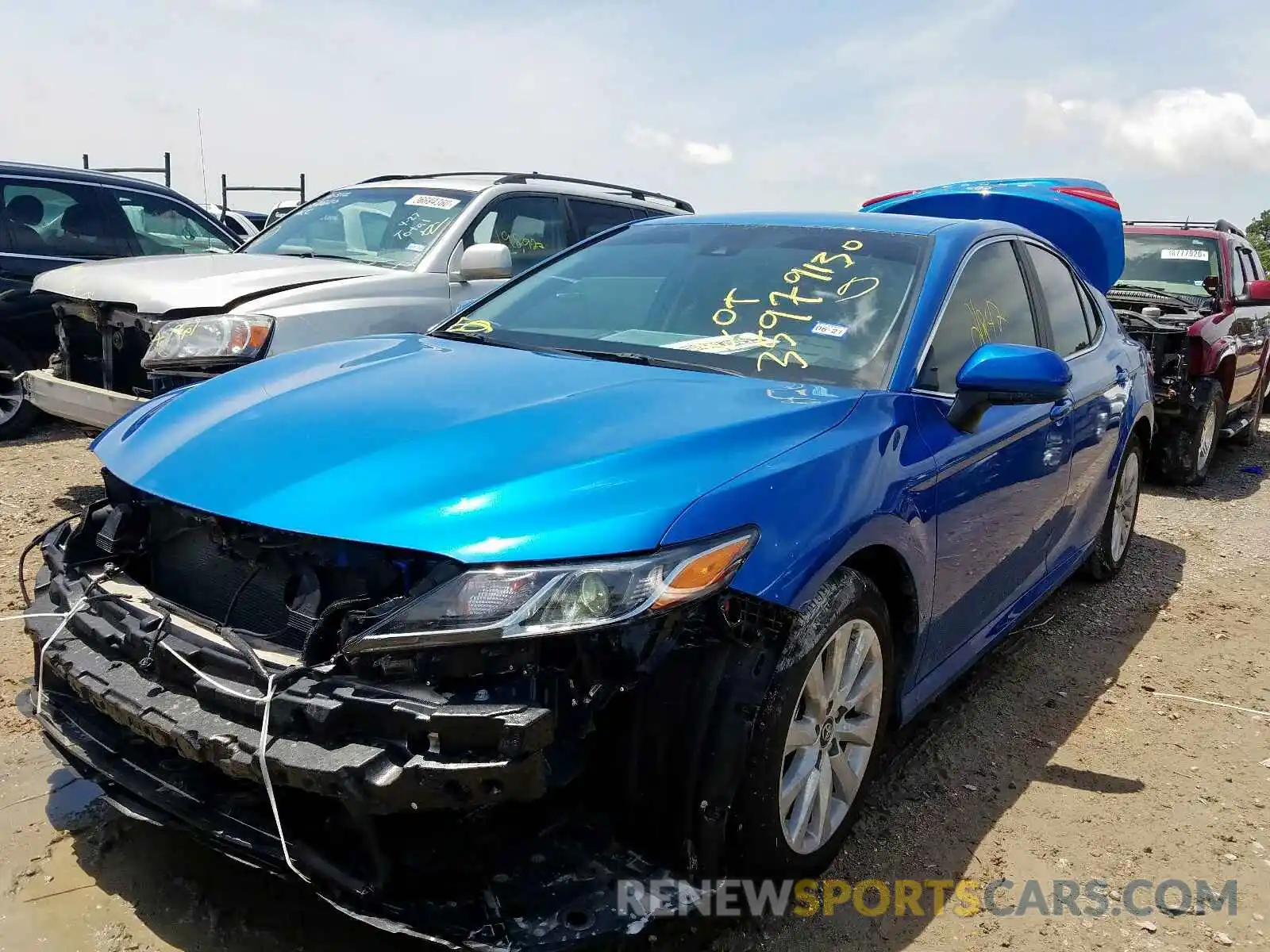 2 Photograph of a damaged car 4T1B11HK5KU260967 TOYOTA CAMRY 2019