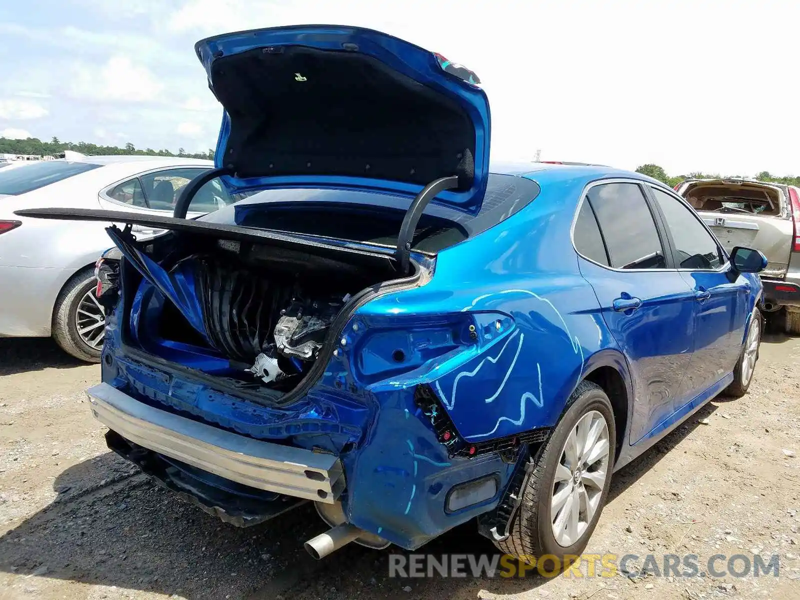 4 Photograph of a damaged car 4T1B11HK5KU260967 TOYOTA CAMRY 2019